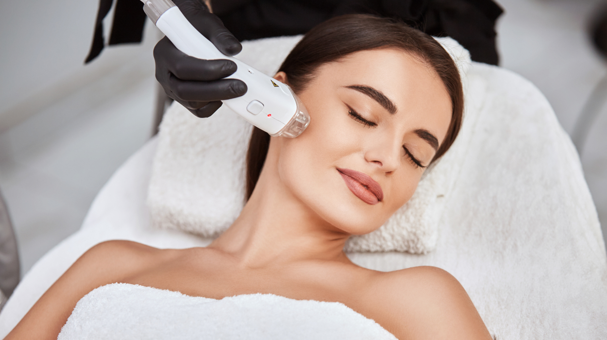 Woman receiving medical spa treatment at an appointment booked with the best med spa software.