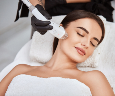 Woman receiving medical spa treatment at an appointment booked with the best med spa software.