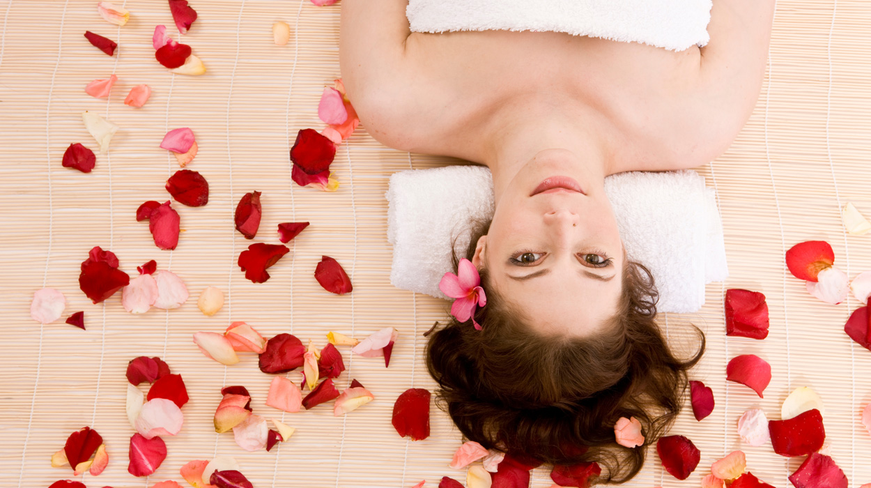 Women enjoying a beauty treatment booked with spa software for small business.