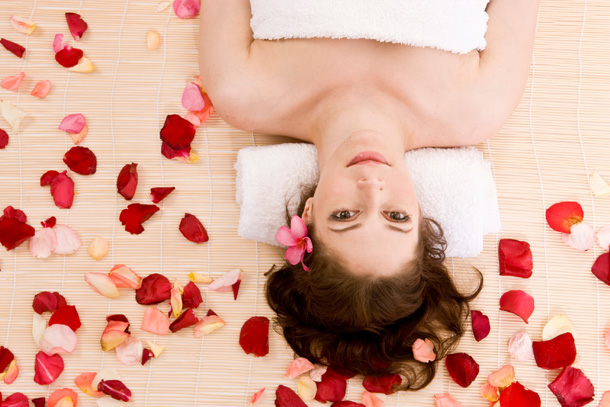 Women enjoying a beauty treatment booked with spa software for small business.