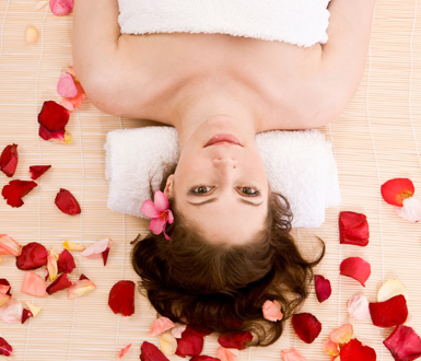 Women enjoying a beauty treatment booked with spa software for small business.