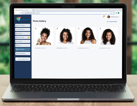 The Client Portal's Photo Gallery displayed on a laptop.