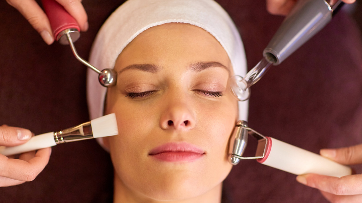 Client with multiple devices showing a combination of different treatments that can be managed through spa management software.