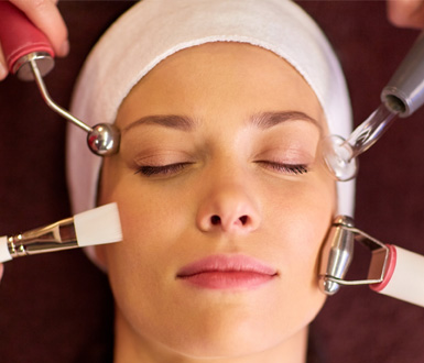 Client with multiple devices showing a combination of different treatments that can be managed through spa management software.