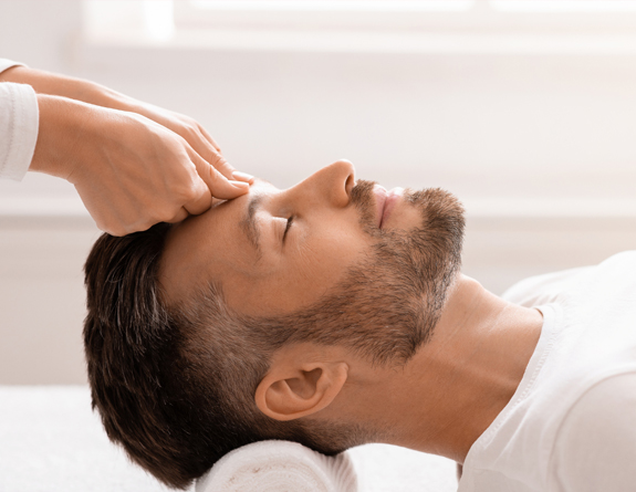 Groom getting prepped for a customized facial a week before his big day.