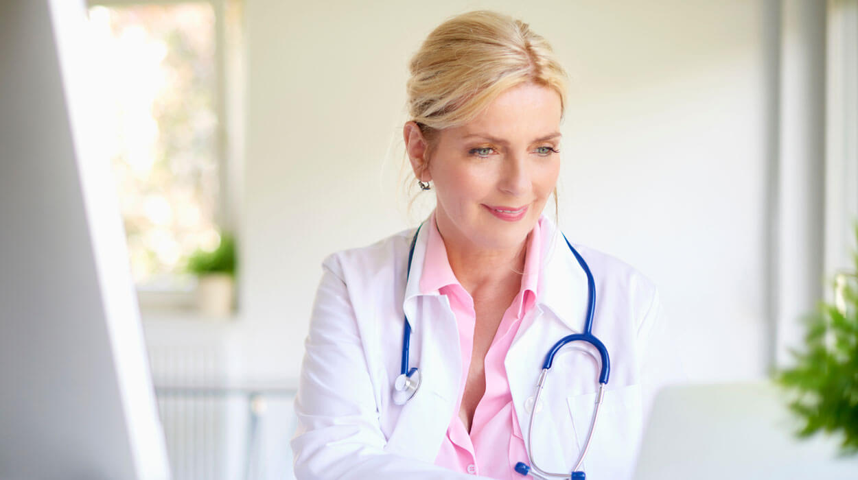 Medical spa owner using medical spa management software to streamline operations.
