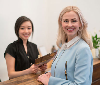 Medspa Customer Smiling at the Counter