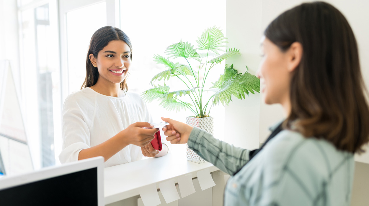 Medspa Client paying for a membership package using medspa management software.