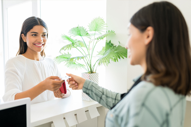 Medspa Client paying for a membership package using medspa management software.