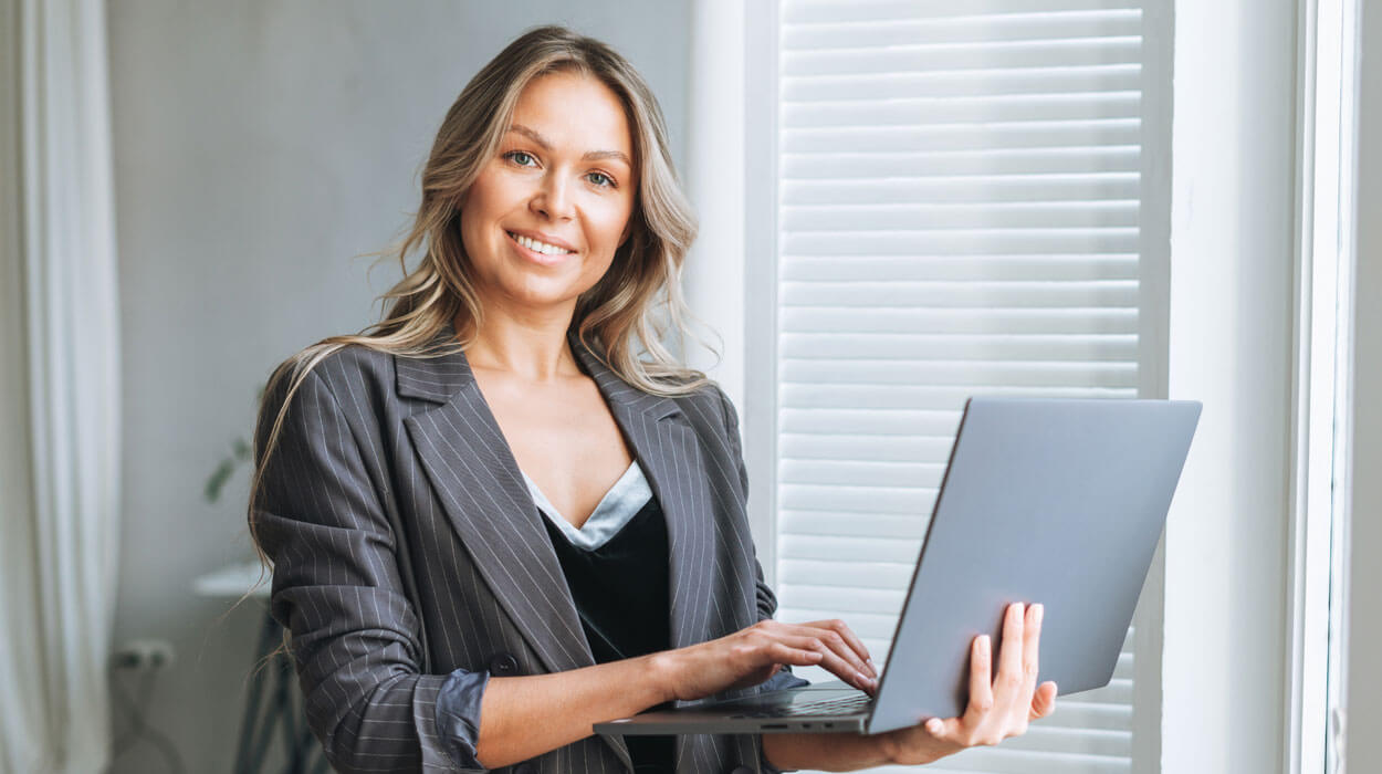 Spa owner using spa management software to easily manage customer experience.