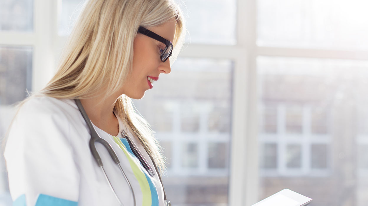 Medical spa professional using secure medspa EMR software.