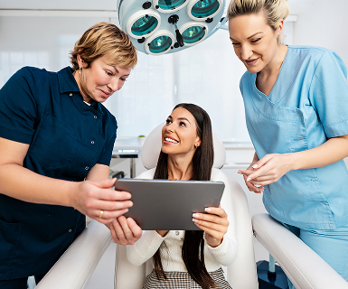 A med spa practice using medi spa software with built-in EMR during an appointment.