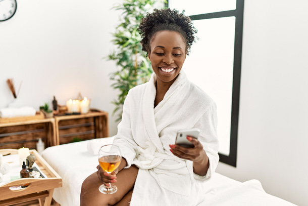 Medspa client smiling at service discount sent via best medical spa software