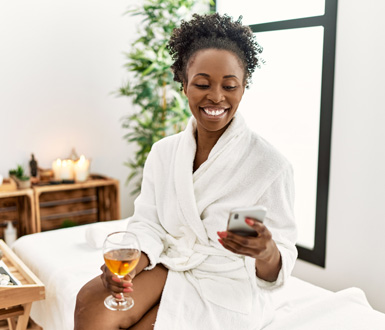 Medspa client smiling at service discount sent via best medical spa software