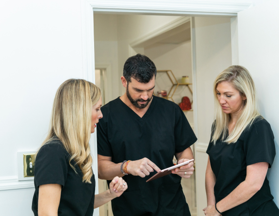 Medical spa team using AestheticsPro medical spa management software to easily navigate their day-to-day operations.