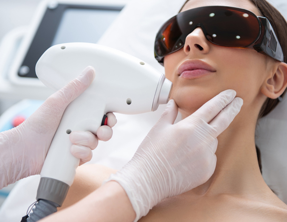 A medspa client receiving laser treatment.