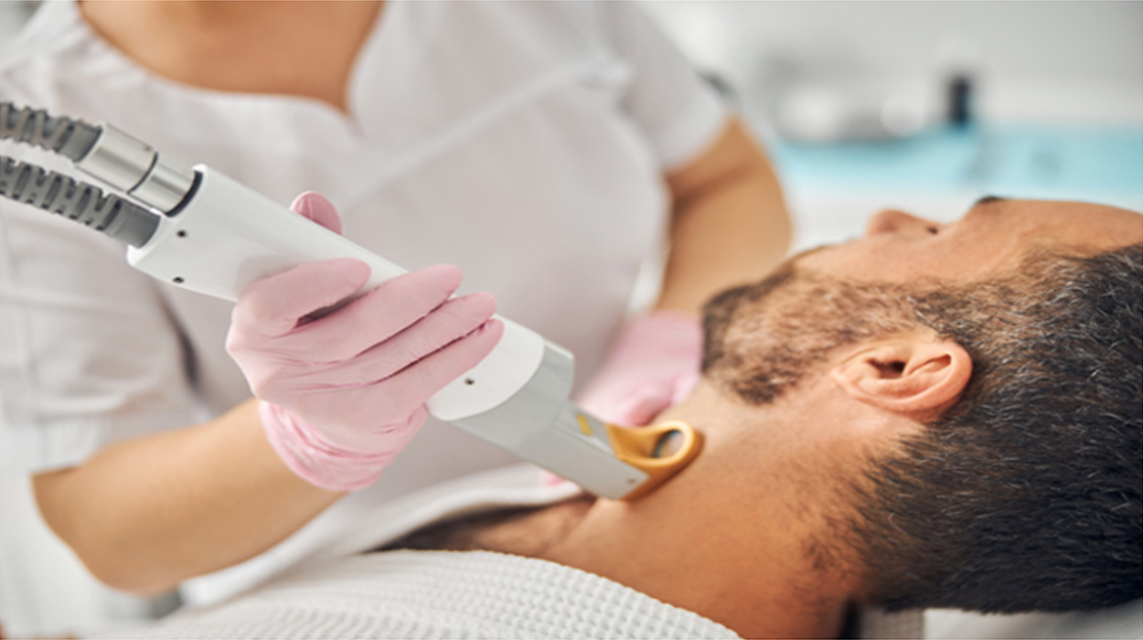 Male receiving laser hair removal service at his medi spa.