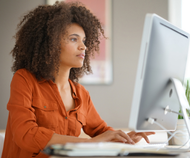 Med spa manager reviewing best medical spa software showing practice growth.