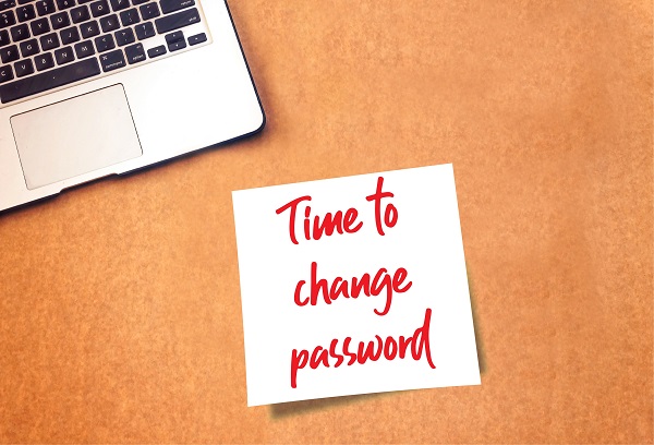 A stickynote that states 'time to change your password' in red