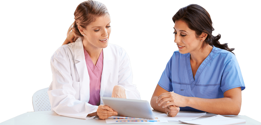 A doctor and a nurse talk as they look into a file